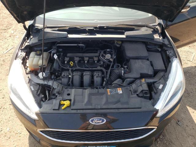 Photo 11 from auction – 2016 FORD FOCUS SE with VIN 1FADP3F25GL357602