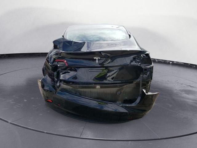 Photo 6 from auction – 2022 TESLA MODEL 3 with VIN 5YJ3E1EAXNF186712