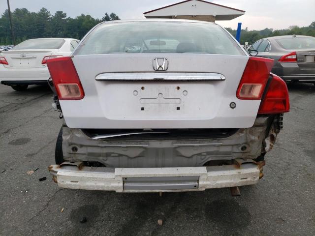 Photo 6 from auction – 2002 HONDA CIVIC LX with VIN 1HGES15562L021786