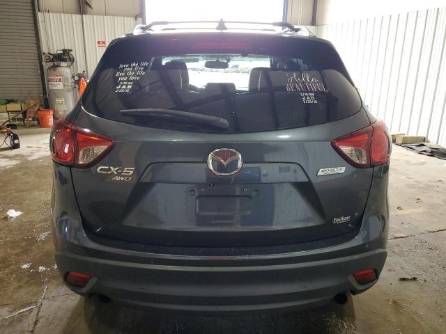 Photo 6 from auction – 2013 MAZDA CX-5 GT with VIN JM3KE4DE3D0107189