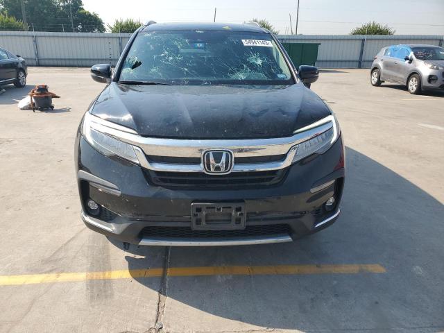 Photo 5 from auction – 2019 HONDA PILOT TOUR with VIN 5FNYF5H69KB042937