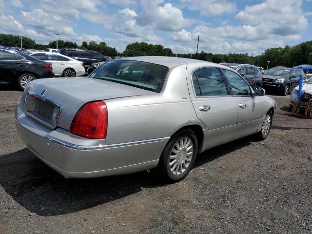 Photo 3 from auction – 2004 LINCOLN TOWN CAR U with VIN 1LNHM83W74Y653594