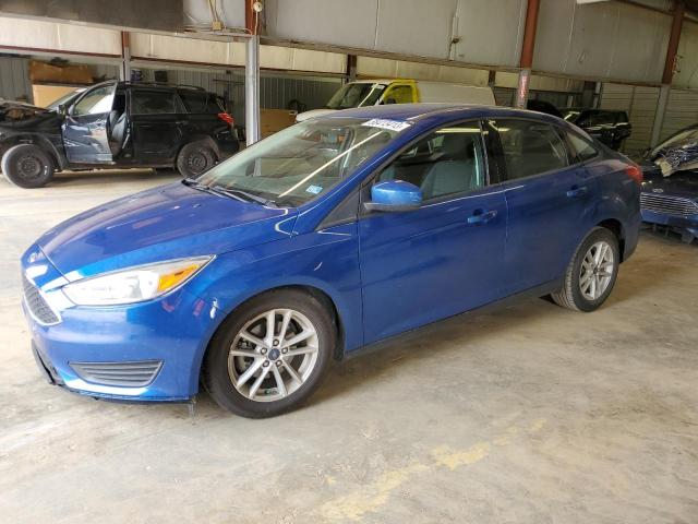 FORD FOCUS SE 2018 with VIN 1FADP3FE8JL309092 - Photo from auction