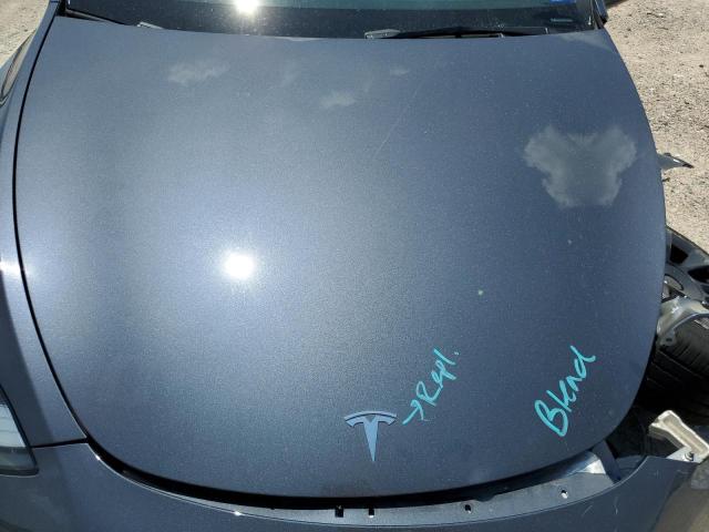 Photo 11 from auction – 2023 TESLA MODEL Y with VIN 7SAYGDEE4PA076763
