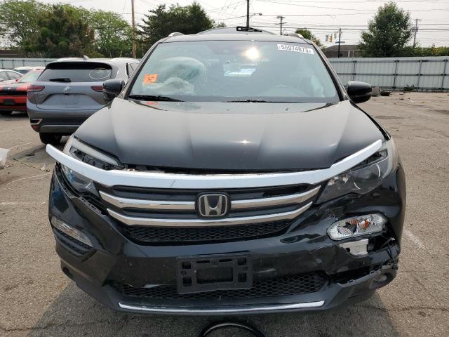 Photo 5 from auction – 2017 HONDA PILOT TOUR with VIN 5FNYF6H99HB089278