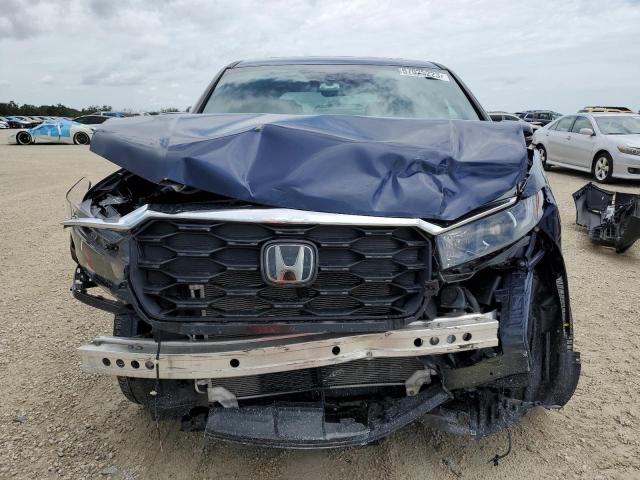 Photo 5 from auction – 2022 HONDA PASSPORT E with VIN 5FNYF7H52NB004442
