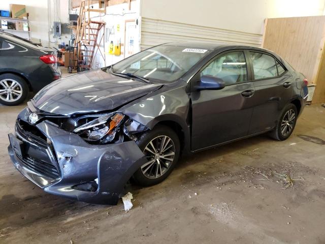 TOYOTA COROLLA L 2017 with VIN 5YFBURHE0HP627574 - Photo from auction