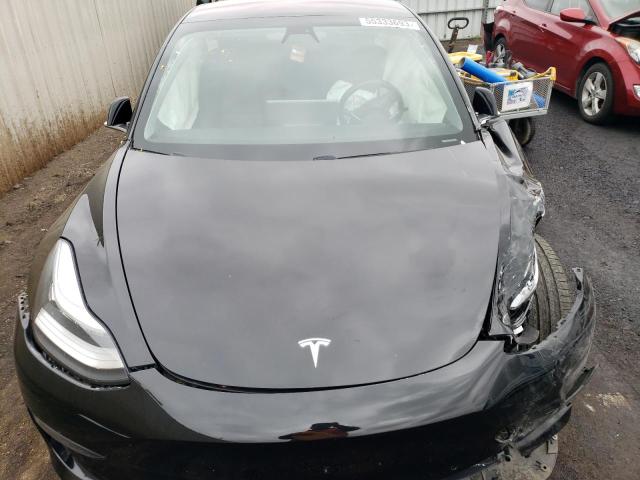 Photo 11 from auction – 2019 TESLA MODEL 3 with VIN 5YJ3E1EA4KF324689
