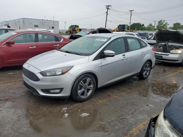 FORD FOCUS SE 2016 with VIN 1FADP3FE7GL314390 - Photo from auction