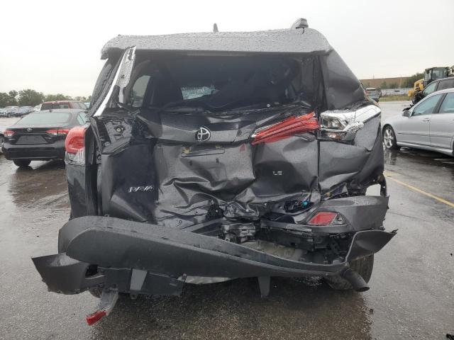 Photo 6 from auction – 2018 TOYOTA RAV4 LE with VIN 2T3ZFREV7JW505531