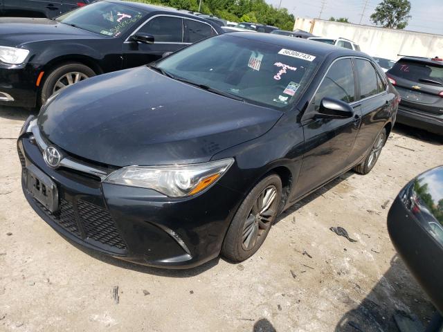 TOYOTA CAMRY LE 2017 with VIN 4T1BF1FKXHU655434 - Photo from auction