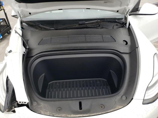 Photo 11 from auction – 2022 TESLA MODEL Y with VIN 7SAYGAEE8NF408153
