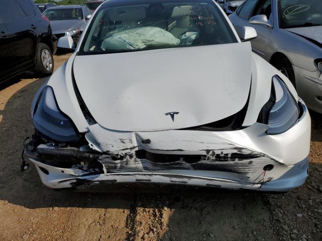 Photo 11 from auction – 2022 TESLA MODEL 3 with VIN 5YJ3E1EB3NF114646