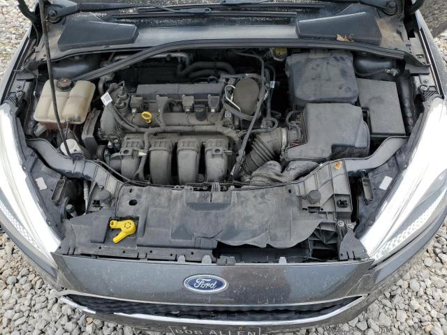 Photo 11 from auction – 2016 FORD FOCUS SE with VIN 1FADP3F25GL230445