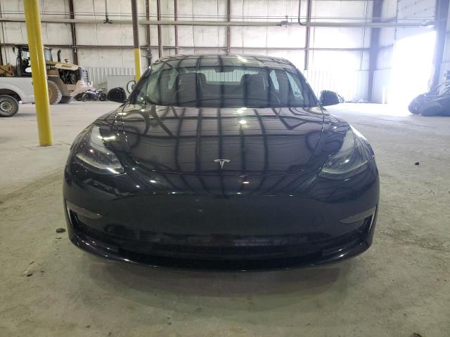 Photo 5 from auction – 2022 TESLA MODEL 3 with VIN 5YJ3E1EB0NF128973