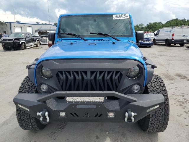 Photo 5 from auction – 2015 JEEP WRANGLER U with VIN 1C4BJWDG6FL502762
