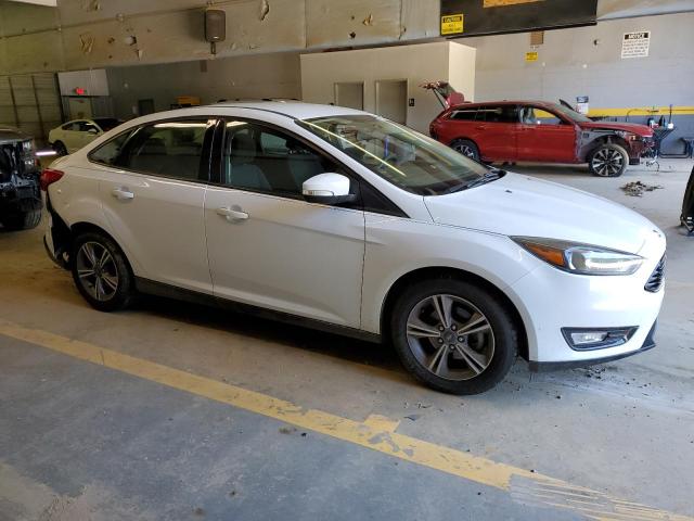 Photo 4 from auction – 2017 FORD FOCUS SE with VIN 1FADP3FE4HL311822