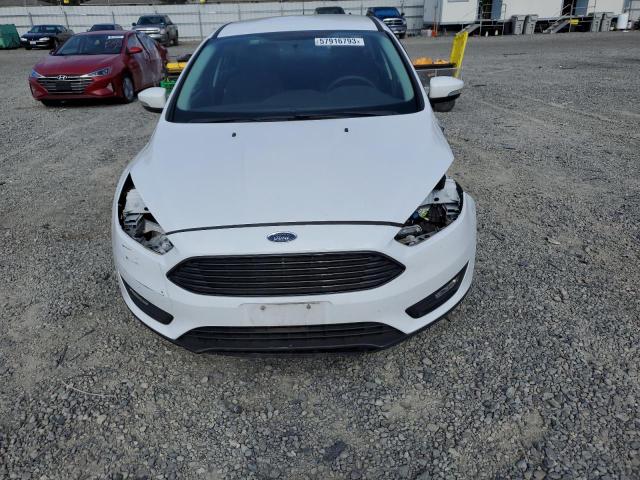 Photo 5 from auction – 2018 FORD FOCUS SE with VIN 1FADP3F25JL271598