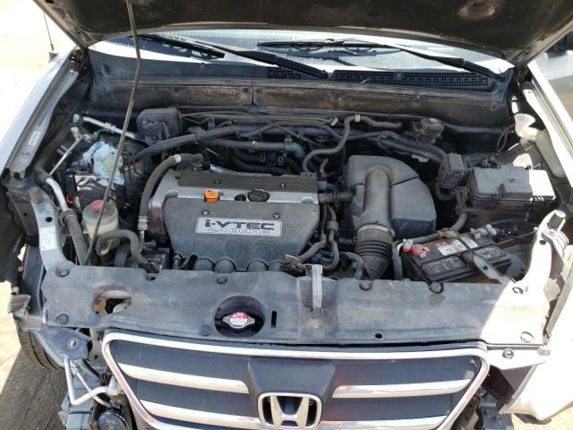 Photo 12 from auction – 2006 HONDA CR-V LX with VIN JHLRD78576C014282
