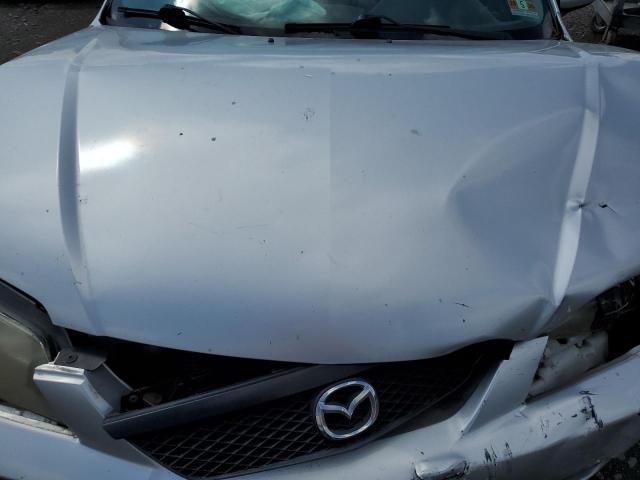 Foto 11 de la subasta – 2003 MAZDA PROTEGE DX con VIN JM1BJ225530124618