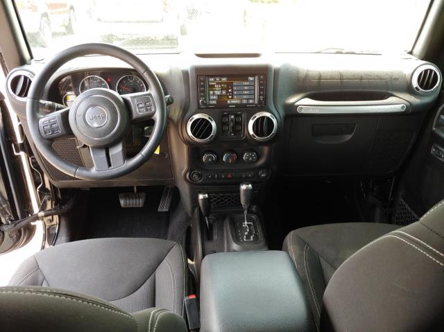 Photo 9 from auction – 2015 JEEP WRANGLER U with VIN 1C4BJWEG9FL729037