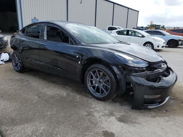 Photo 4 from auction – 2021 TESLA MODEL 3 with VIN 5YJ3E1EA7MF091068