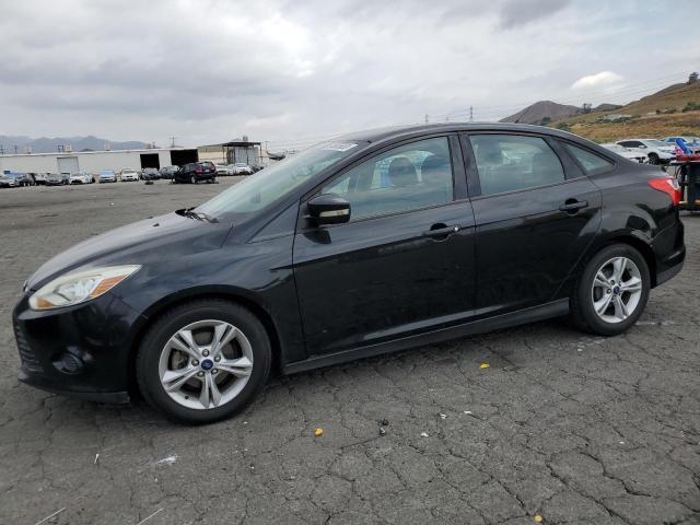 FORD FOCUS 2014 with VIN 1FADP3F20EL453540 - Photo from auction