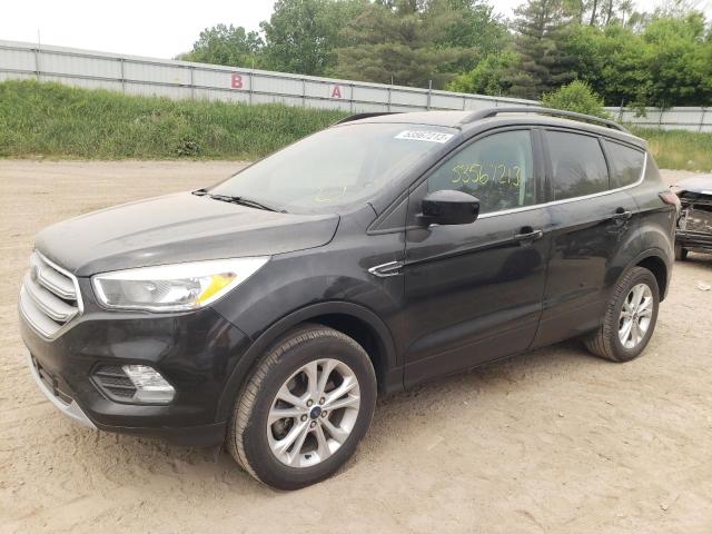 Photo 1 from auction – 2018 FORD ESCAPE SE with VIN 1FMCU9GD8JUA31937