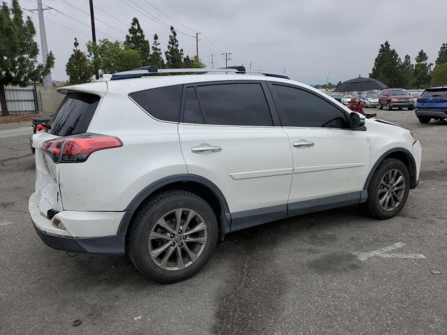 Photo 3 from auction – 2017 TOYOTA RAV4 LIMIT with VIN JTMYFREV6HJ717468