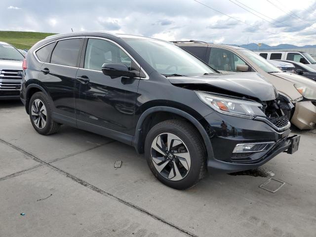 Photo 4 from auction – 2015 HONDA CR-V TOURI with VIN 5J6RM4H94FL072679