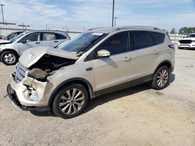 FORD ESCAPE TIT 2017 with VIN 1FMCU0J95HUE64836 - Photo from auction