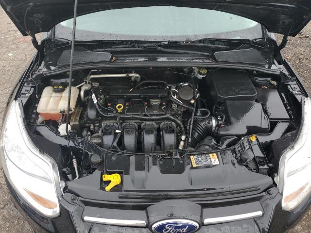 Photo 11 from auction – 2014 FORD FOCUS S with VIN 1FADP3E24EL360618