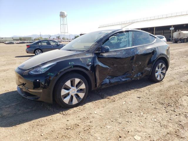 TESLA MODEL Y 2023 with VIN 7SAYGDEE0PA090756 - Photo from auction