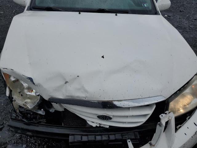 Photo 11 from auction – 2006 KIA SPECTRA LX with VIN KNAFE121765316222