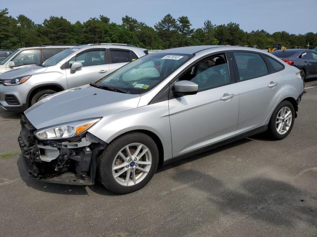FORD FOCUS SE 2018 with VIN 1FADP3F2XJL316647 - Photo from auction