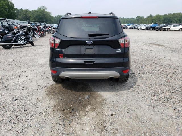 Photo 6 from auction – 2018 FORD ESCAPE SE with VIN 1FMCU0GD4JUB75299