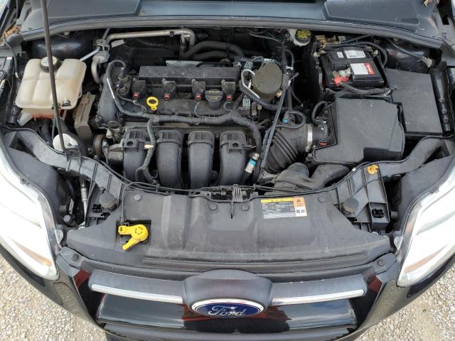 Photo 11 from auction – 2013 FORD FOCUS SE with VIN 1FADP3F23DL331785