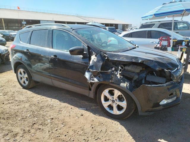 Photo 4 from auction – 2014 FORD ESCAPE SE with VIN 1FMCU9G99EUD31519