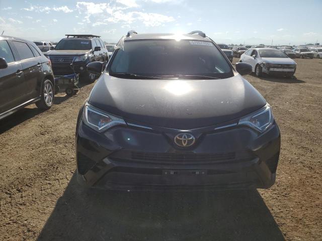 Photo 5 from auction – 2017 TOYOTA RAV4 LE with VIN 2T3BFREV6HW619824