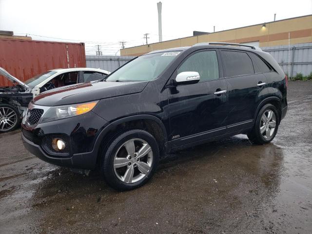 KIA SORENTO EX 2012 with VIN 5XYKUDA20CG277153 - Photo from auction
