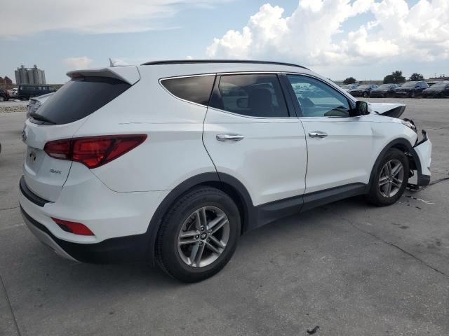 Photo 3 from auction – 2018 HYUNDAI SANTA FE S with VIN 5NMZU3LB4JH103949