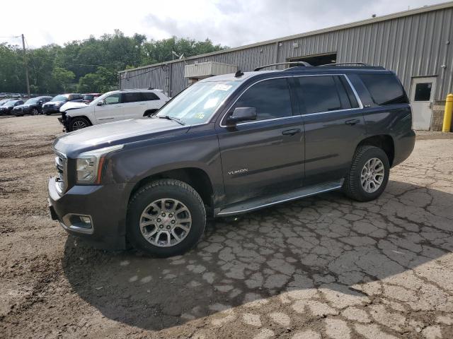 GMC YUKON SLE 2015 with VIN 1GKS2AKCXFR202434 - Photo from auction