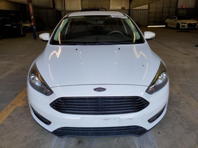 Photo 5 from auction – 2017 FORD FOCUS SE with VIN 1FADP3FE4HL311822