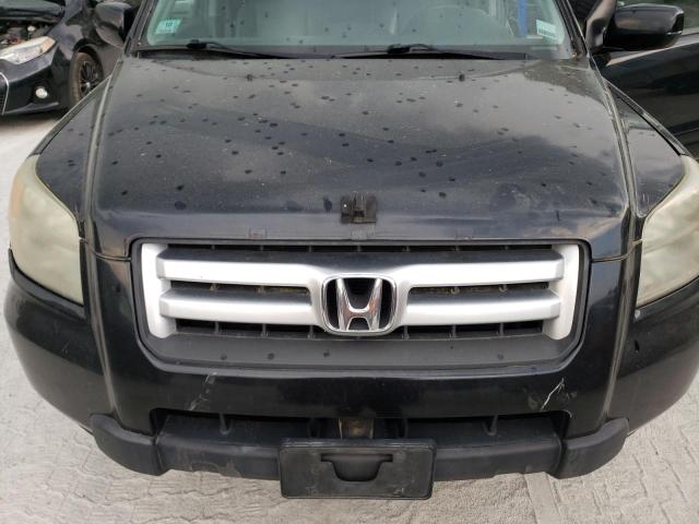 Photo 12 from auction – 2006 HONDA PILOT EX with VIN 2HKYF18766H564269