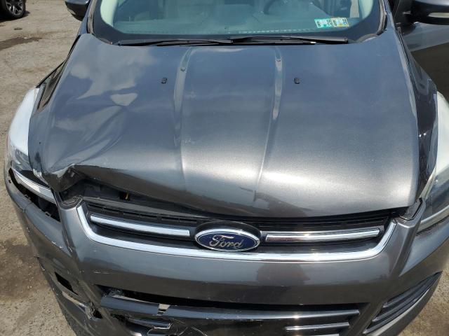 Photo 11 from auction – 2016 FORD ESCAPE TIT with VIN 1FMCU0J99GUA35004