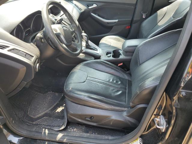 Foto 7 de la subasta – 2014 FORD FOCUS SE con VIN 1FADP3F21EL216247