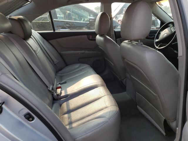 Photo 10 from auction – 2006 KIA OPTIMA LX with VIN KNAGE124265056116