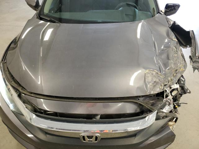 Photo 11 from auction – 2016 HONDA CIVIC LX with VIN 19XFC2F52GE012278