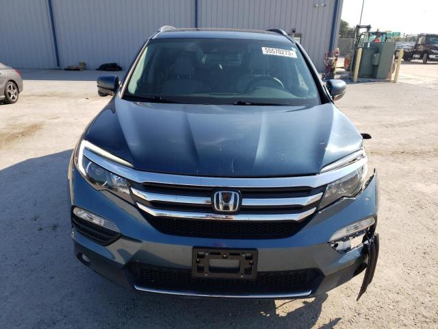 Photo 5 from auction – 2017 HONDA PILOT TOUR with VIN 5FNYF5H94HB032206