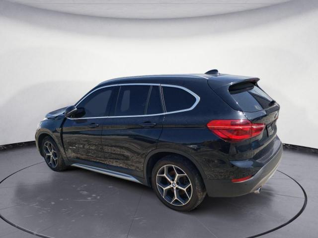 Photo 2 from auction – 2016 BMW X1 XDRIVE2 with VIN WBXHT3C3XG5F66963